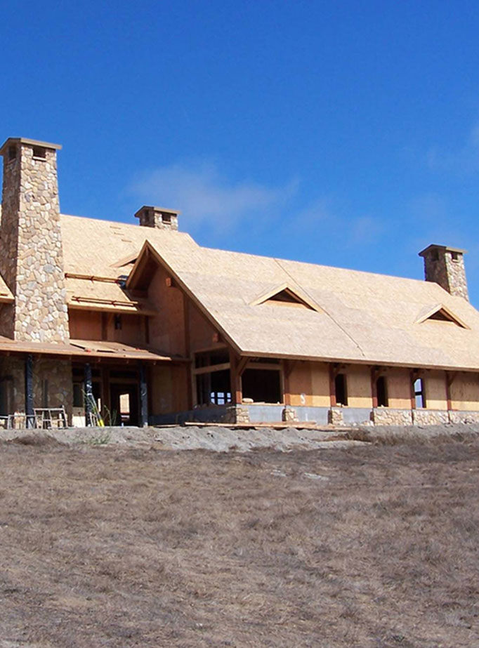 structural insulated panels being installed on a commercial building