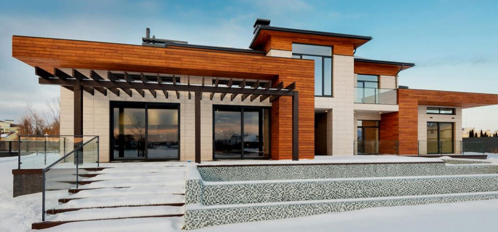 Exterior image of modern home with wood and stone exterior